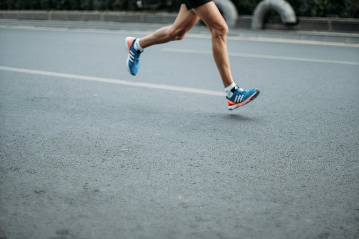 Runner on a path representing jogging with IBD planning